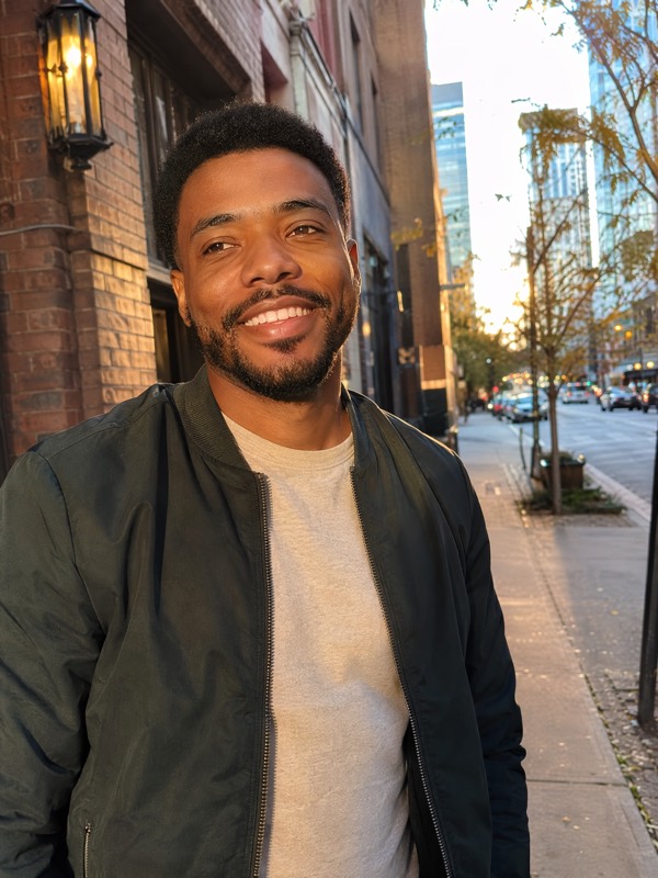 Natural dating profile portrait of a man on a city street